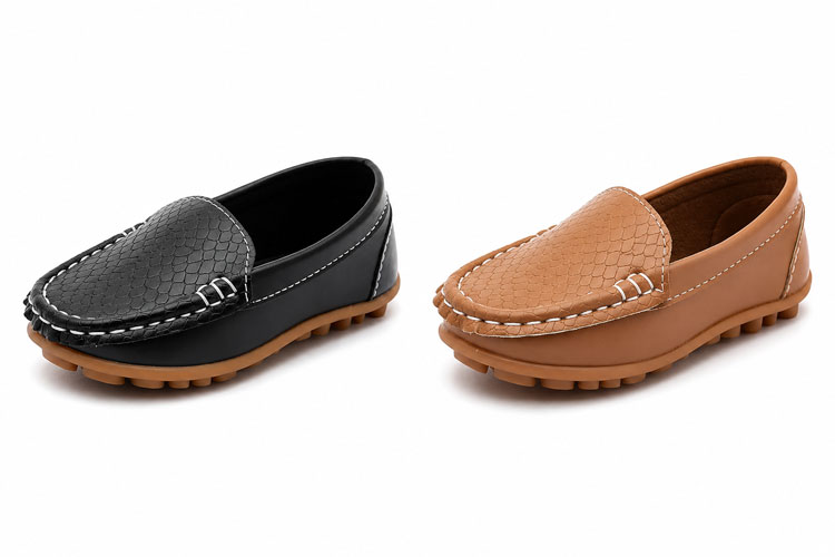 Black and brown kids slip-on loafer dress shoes with textured uppers.