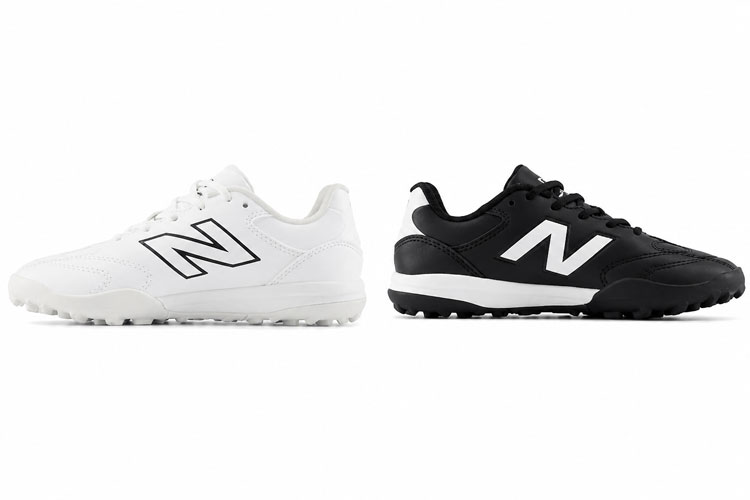 New Balance kids' wide turf soccer shoes in black and white color options for children with wide feet.