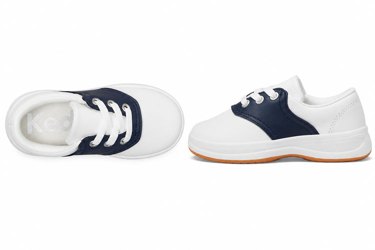 White kids school shoe shown from the top and side views on a white background with lace-up closure and supportive sole.
