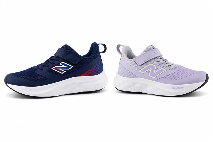 Navy and lavender New Balance kids sneakers with Velcro straps displayed side by side. Available in wide and extra wide widths, these supportive sneakers provide a comfortable fit for children with wider feet.
