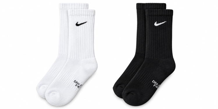Nike Dri-FIT crew socks for kids in white and black.