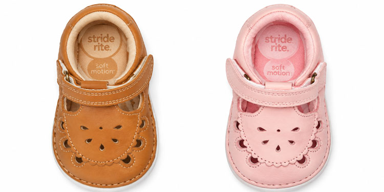 Stride Rite baby sandals in brown and pink, available in wide widths, featuring rounded toe boxes, extra depth, and adjustable Velcro straps for babies with wide feet and high insteps.